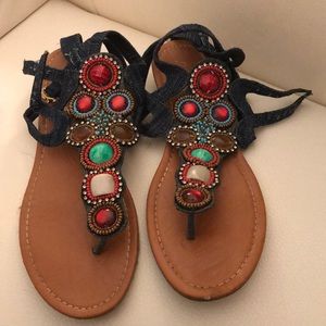 Sandals that strap on the ankle